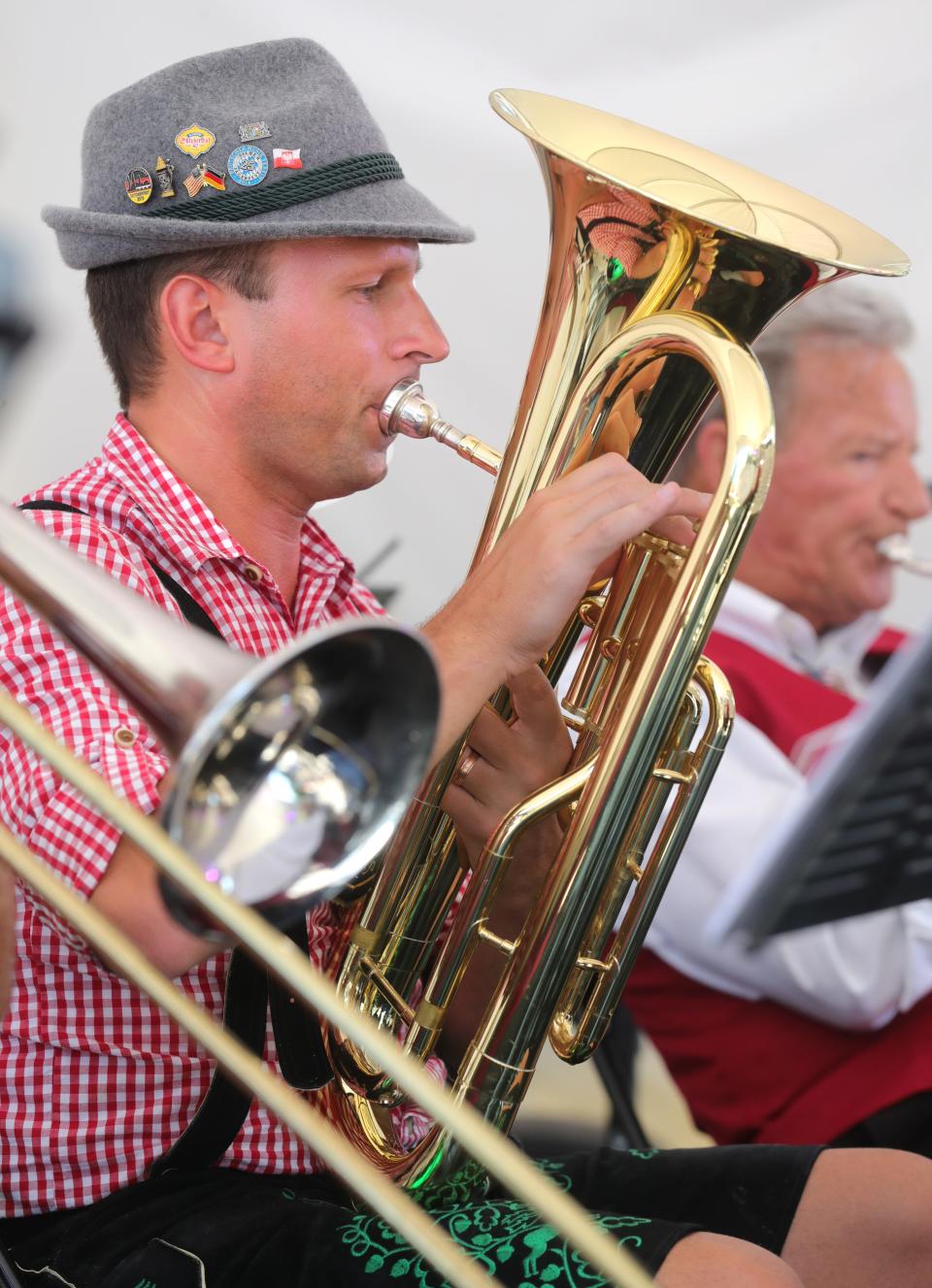 Cleveland Donauschwaben Blaskapelle member Mike Prochko plays the baritone at the 41st annual Cuyahoga Falls Oktoberfest in 2021.