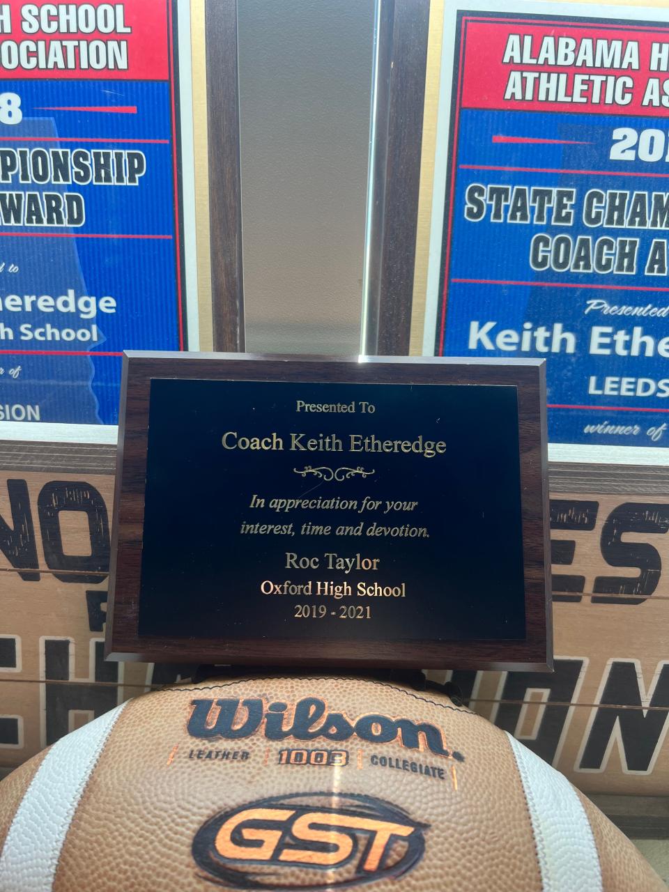 A plaque given by Memphis football wide receiver Roc Taylor to his high school coach, Keith Etheredge.