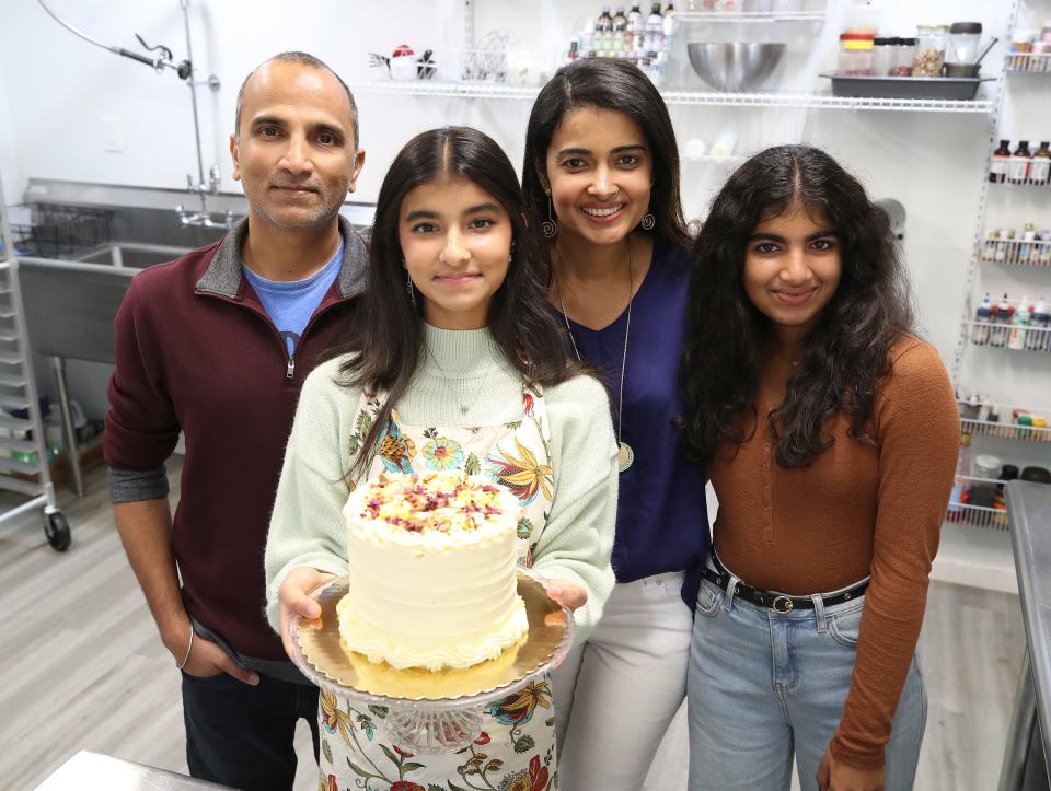 13-year old Mysha Chasmawala (foreground, with her family.  LEFT TO RIGHT: Father Munaf, mom Alifiya, and sister Zahra, 15.