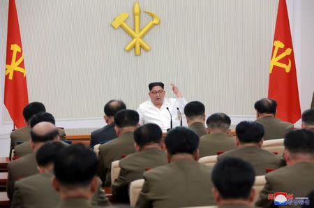 North Korean leader Kim Jong Un speaks during The first enlarged meeting of the seventh Central Military Commission of the Workers' Party of Korea (WPK), in this undated photo released by North Korea's Korean Central News Agency (KCNA) in Pyongyang May 18, 2018. KCNA/via REUTERS