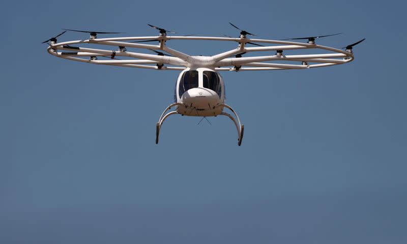 A Volocopter air-taxi performs a flight over Le Bourget airport