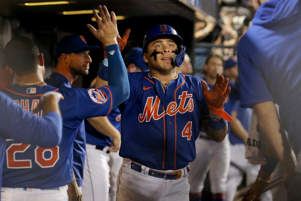 Jul 18, 2023; New York City, New York, USA; New York Mets catcher Francisco Alvarez (4) celebrates his two run home run against the Chicago White Sox with teammates in the dugout during the sixth inning at Citi Field. Mandatory Credit: Brad Penner-USA TODAY Sports