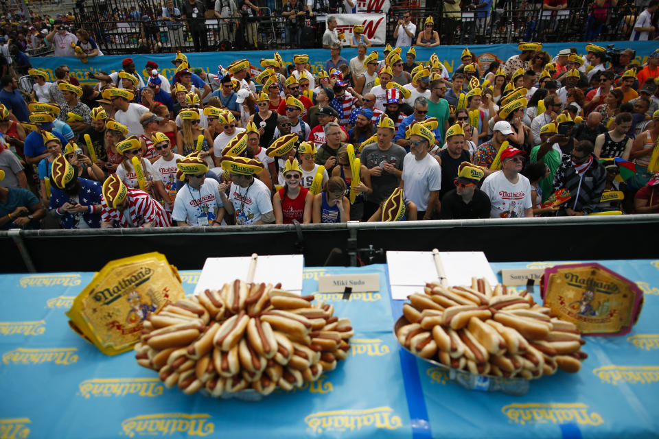 People attend the Annual Nathan's Hot Dog Eating Contest on July 4.