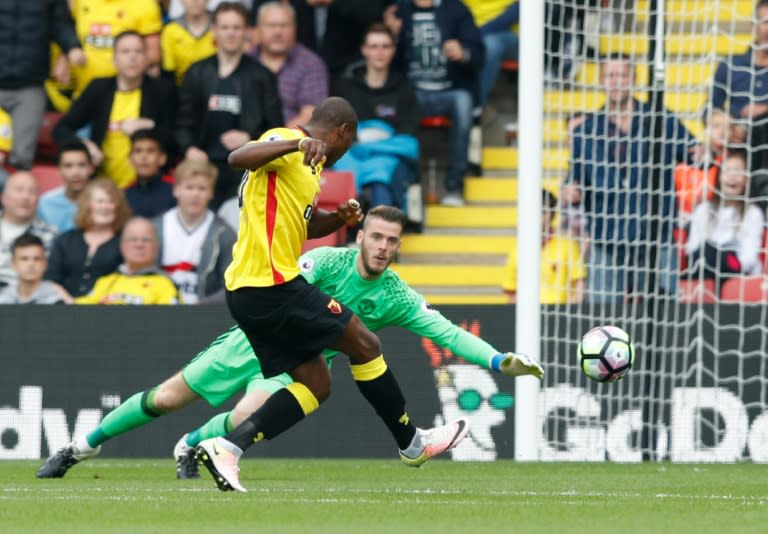 Watford's Odion Ighalo (right) misses an open goal by Manchester United's David de Gea during the Premier League match at Vicarage Road Stadium in Watford, on September 18, 2016