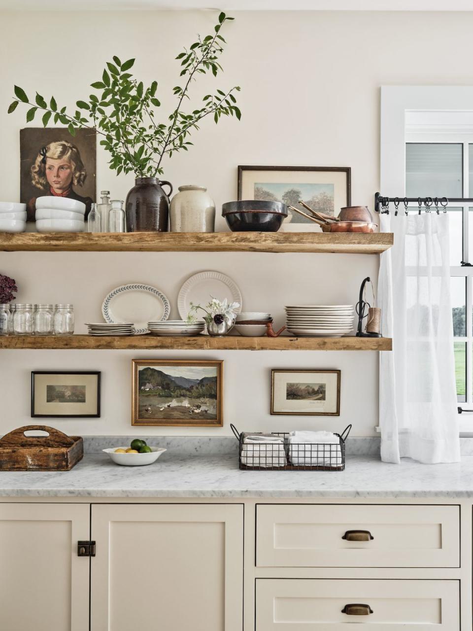 neutral farmhouse kitchen with rustic wood shelves