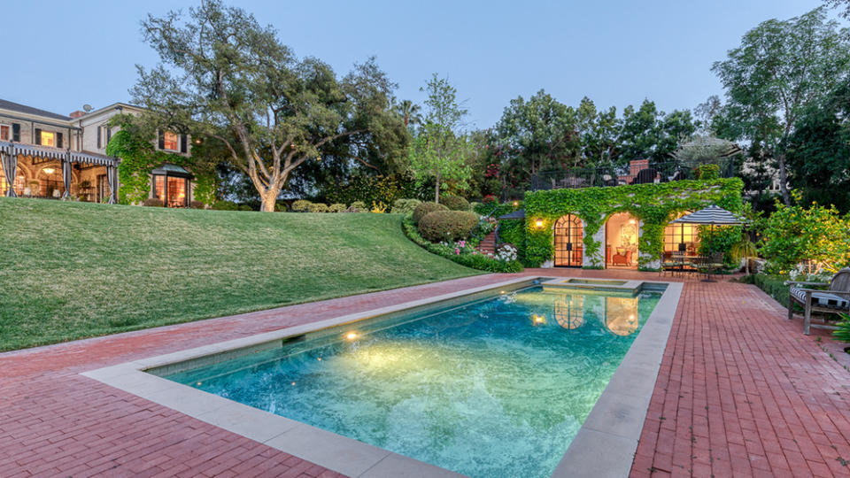 The pool is accompanied by a large pool house. - Credit: Shawn Bishop