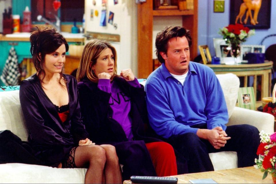 Perry, pictured here with co-stars Courteney Cox and Jennifer Aniston, was best known for his role as Chandler Bing (Getty Images).