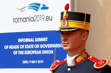 A member of the honour guard stands guard prior to the informal meeting of European Union leaders in Sibiu, Romania, May 9, 2019. REUTERS/Francois Lenoir