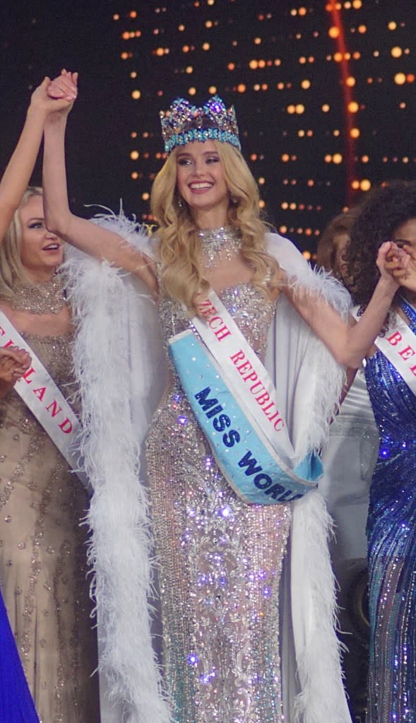 After the reigning Miss World, Karoline Bielawska of Poland, passed the crown to her, Pyszková waved to the large crowd at the Jio World Convention Center and hugged some of the other contestants. Getty Images