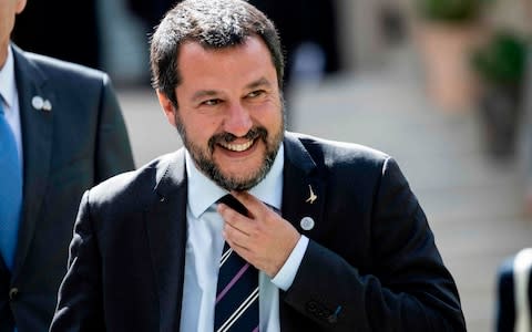 Italy's Interior Minister and Deputy Prime Minister Matteo Salvini reacts before a group photo at the French Ministry of Interior in Paris  - Credit: AFP