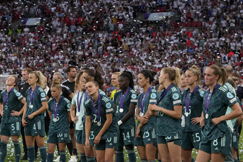 Germany players react at the end of the Women's Euro 2022 final soccer match between England and Germany at Wembley stadium in London, Sunday, July 31, 2022. England won 2-1. (AP Photo/Alessandra Tarantino)