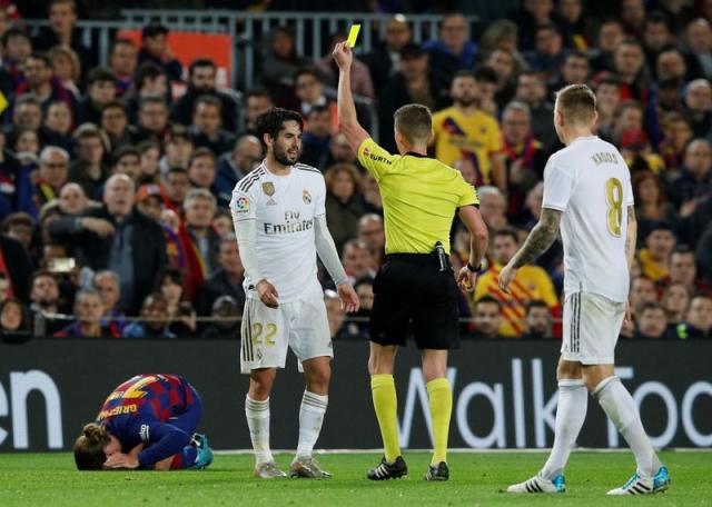 Barcelona and Real Madrid share spoils in goalless 'Clasico' marked by  Catalan protests