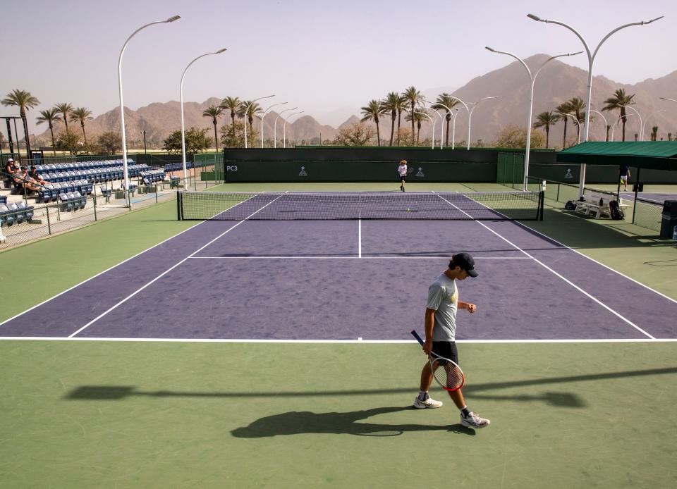 Xavier's Caleb Kassinove celebrates a point against Xavier's Kiefer Brown during the boys' DEL tennis finals in Indian Wells, Calif., Thursday, April 25, 2024.