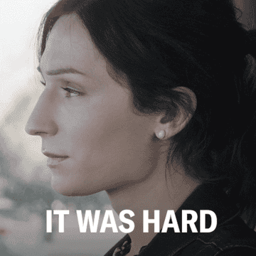 Woman turning to camera with text overlay that reads, "It was hard"