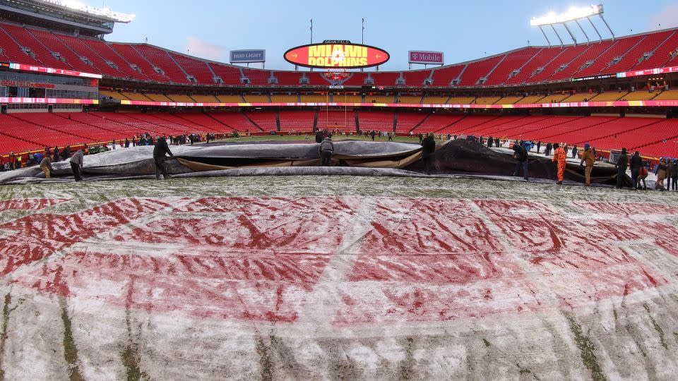 A view of the field at Arrowhead Stadium in Kansas City as the grounds crew removes the cover before the playoff game between the Chiefs and the Dolphins. - Scott Winters/Icon Sportswire/Getty Images