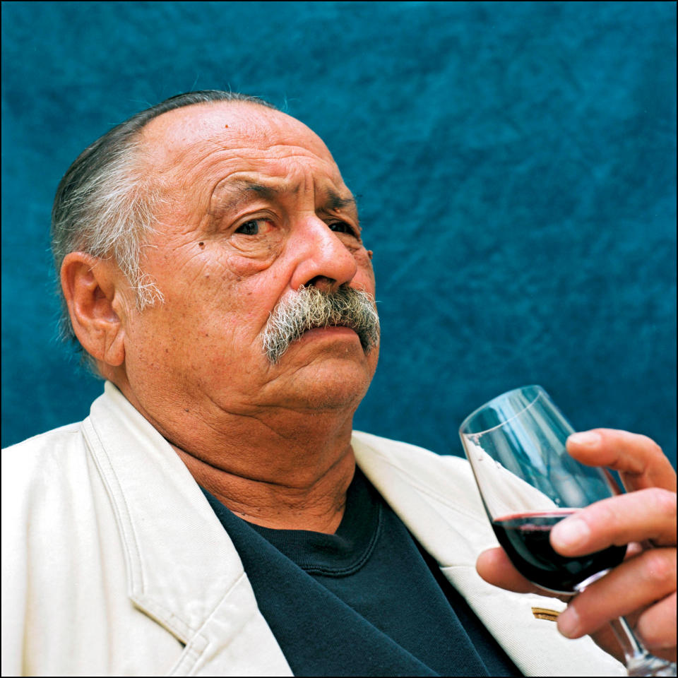 <div class="cell medium-auto caption">Jim Harrison and some wine in France. (Photo: Ulf Andersen/Getty Images)</div> <div class="cell medium-shrink medium-text-right credit">Getty Images</div>