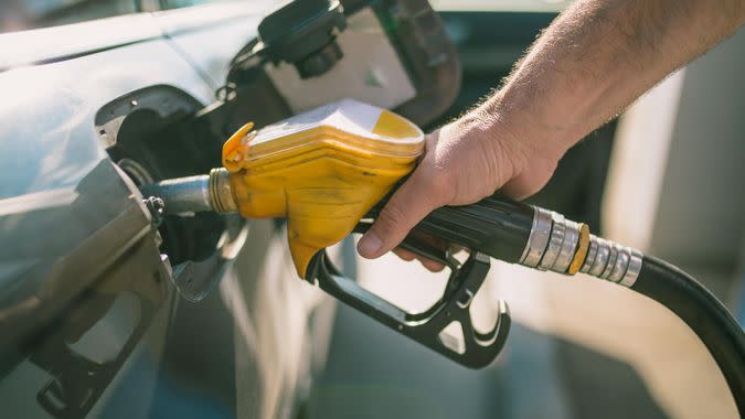 Car refueling on petrol station.