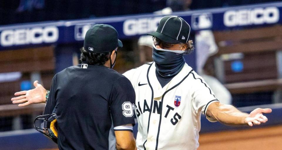 Miami Marlins manager Don Mattingly argues with the home plate umpire, James Hoye, after being tossed from the game during the fifth inning of a Major League Baseball game against the Atlanta Braves at Marlins Park in Miami, Florida on Sunday, August 16, 2020.