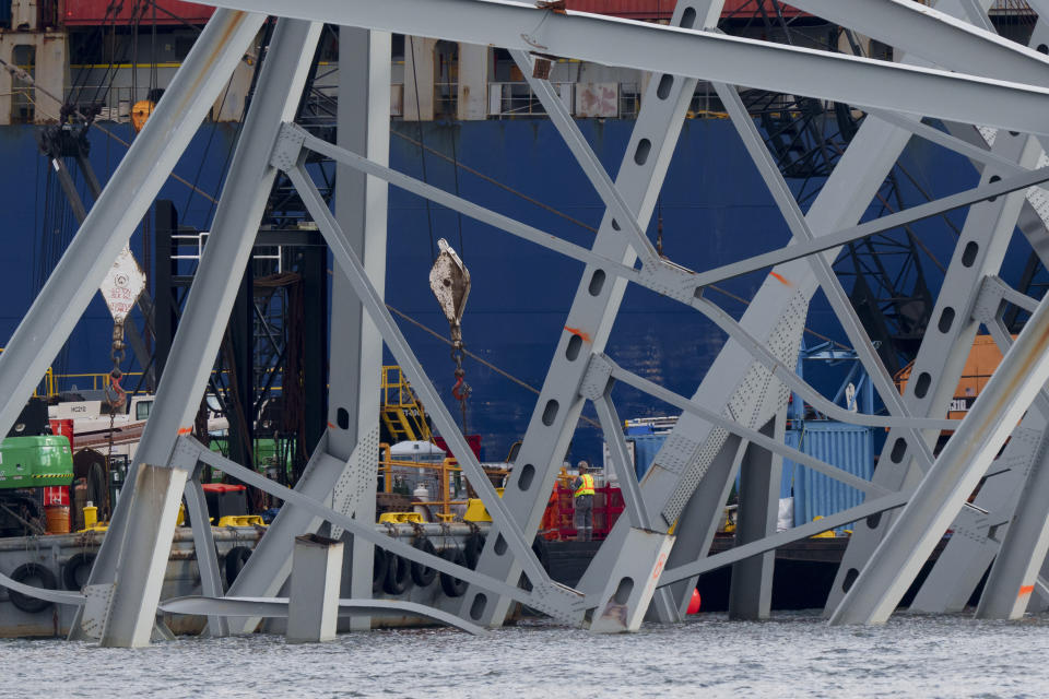 Salvage work continues on the collapsed Francis Scott Key Bridge, Thursday, April 25, 2024, in Baltimore. (AP Photo/Matt Rourke)