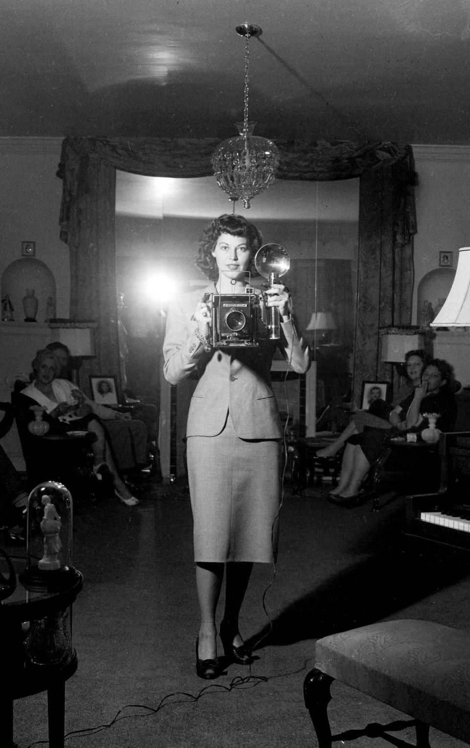 Actress Ava Gardner takes a selfie with News and Observer photographer Lawrence Wofford’s camera on a visit to Raleigh, June 1947.