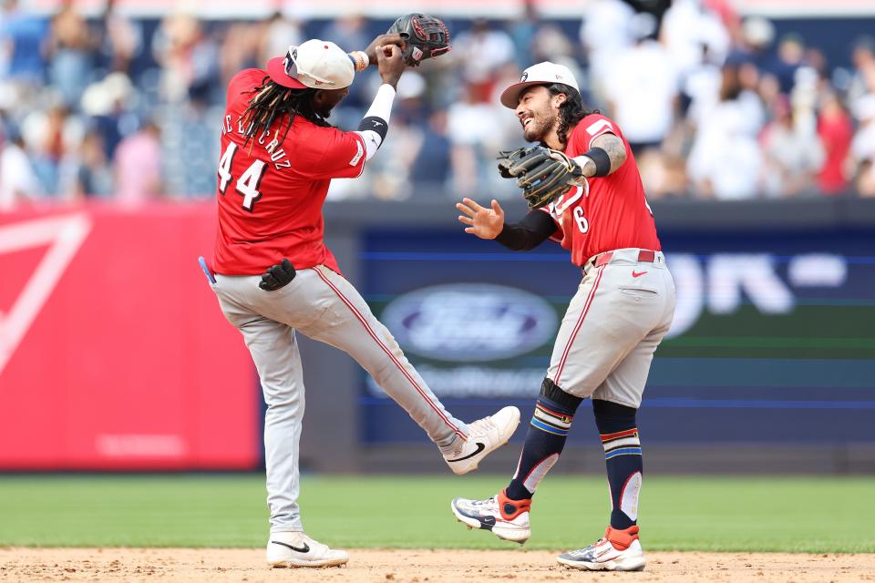 Elly De La Cruz #44 and Jonathan India #6 of the Cincinnati Reds celebrate defeating the New York Yankees after the game July 4 at Yankee Stadium. (Photo by Luke Hales/Getty Images)