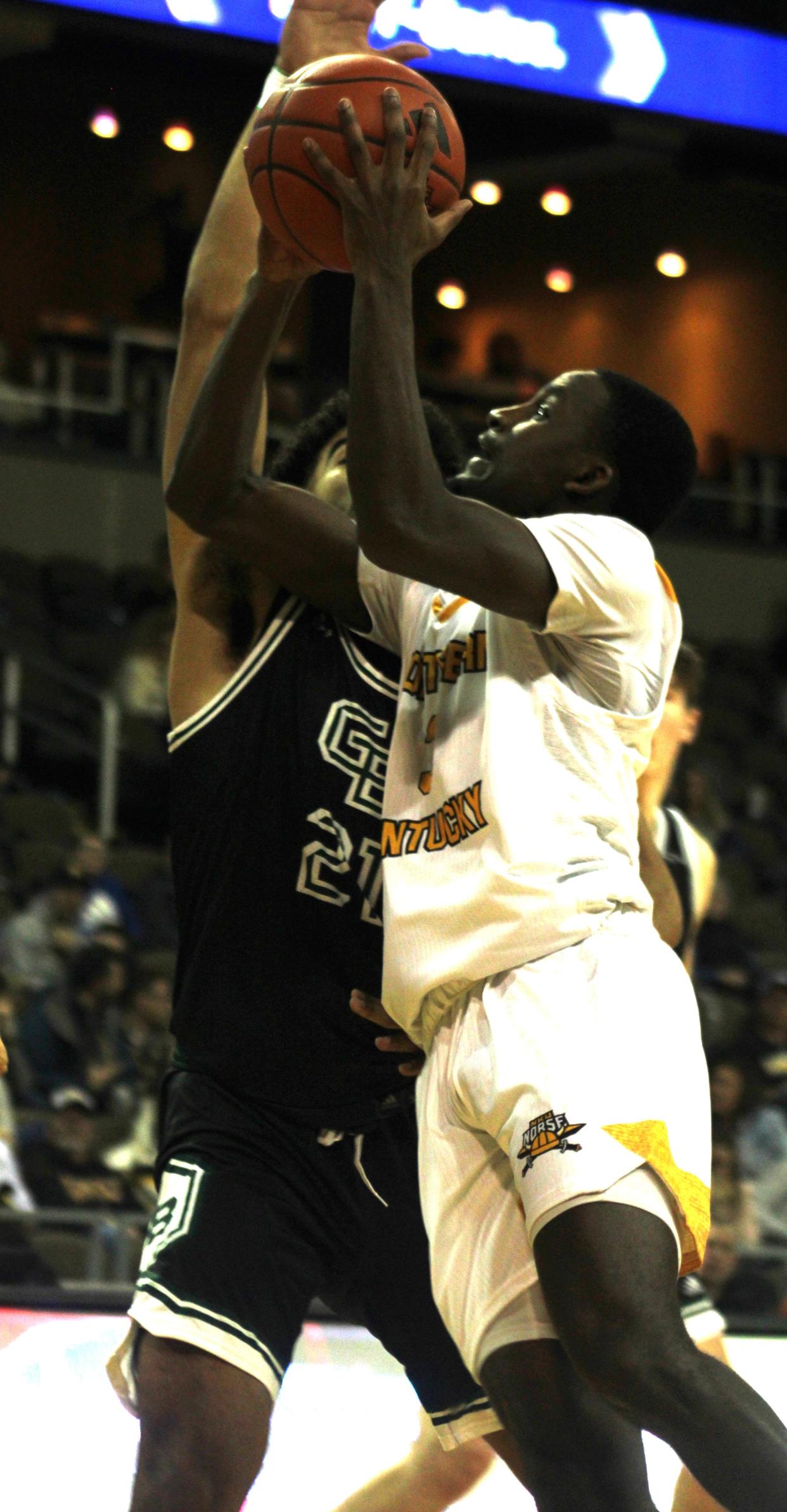 NKU senior Marques Warrick completed four years at NKU and finished as the program's all-time leading scorer with 2,246 points. He broke the record of Drew McDonald.