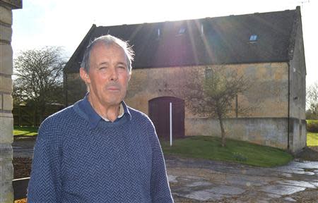 69-year-old farmer Jan Rowe poses for a picture on his farm in the Gloucestershire village of Whittington, March 21, 2014. REUTERS/Jemima Kelly