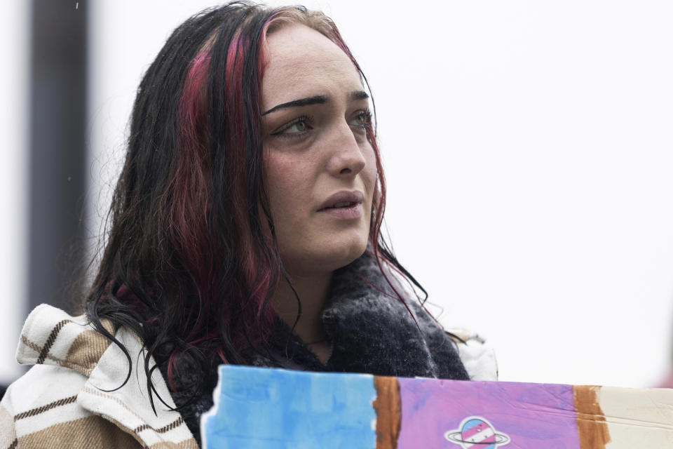 Skye Hansen listens to speakers during a protest on the steps of the Capitol in opposition to HB257 in Salt Lake City, Thursday, Jan. 25, 2024. (Marielle Scott/The Deseret News via AP)