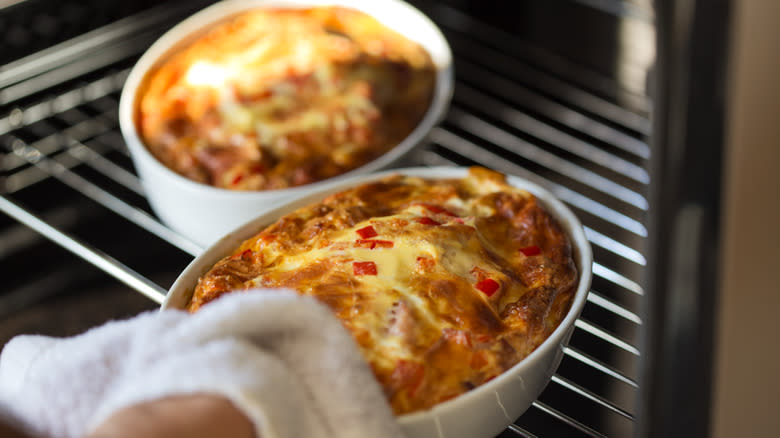 two omelet dishes in oven