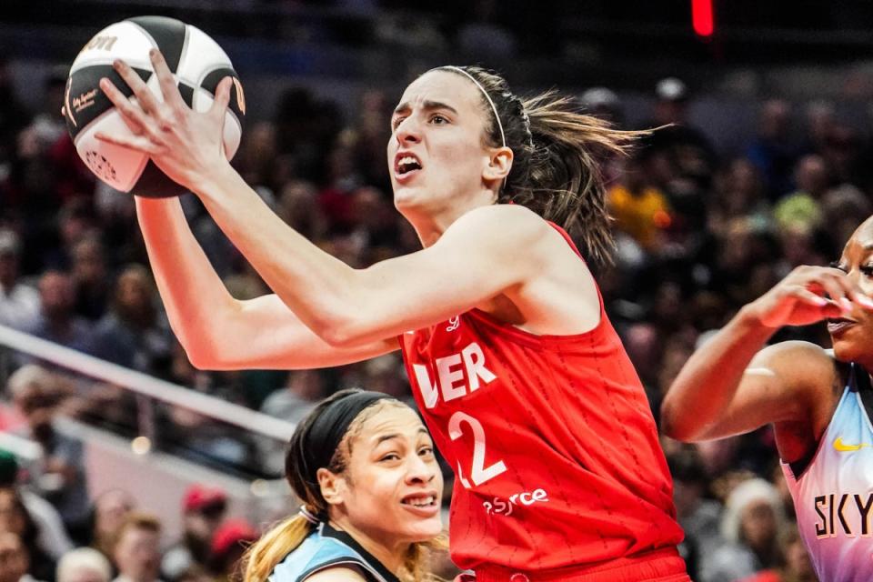 Indiana Fever guard Caitlin Clark drives to the basket against Chicago Sky during a game at Grainbridge Fieldhouse on 1 June 2024  (Michelle Pemberton/Reuters)