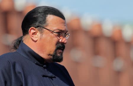 FILE PHOTO: U.S. actor Steven Seagal watches the Victory Day parade, marking the 73rd anniversary of the victory over Nazi Germany in World War Two, at Red Square in Moscow, Russia May 9, 2018. REUTERS/Maxim Shemetov/File Photo