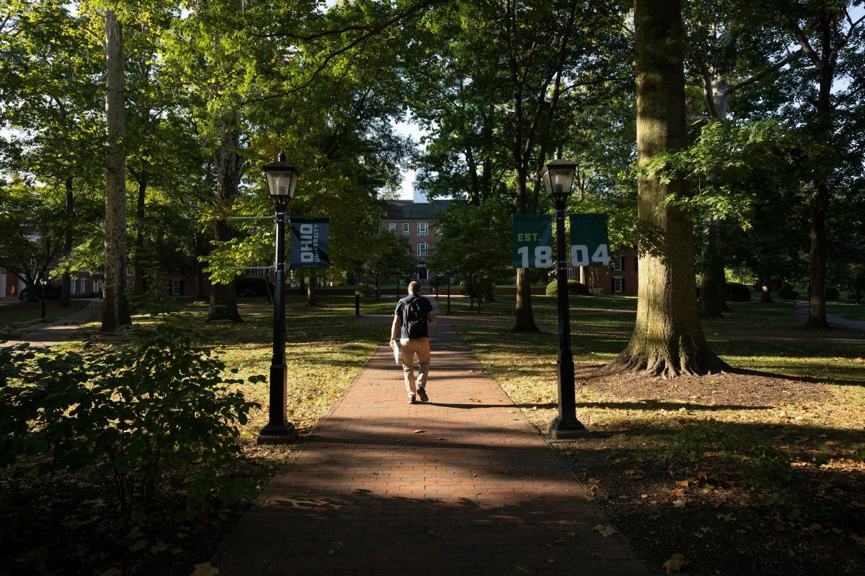 Sep 21, 2023; Athens, Ohio, United States; Students walk on the Ohio University Campus on College Green in Athens, Ohio.