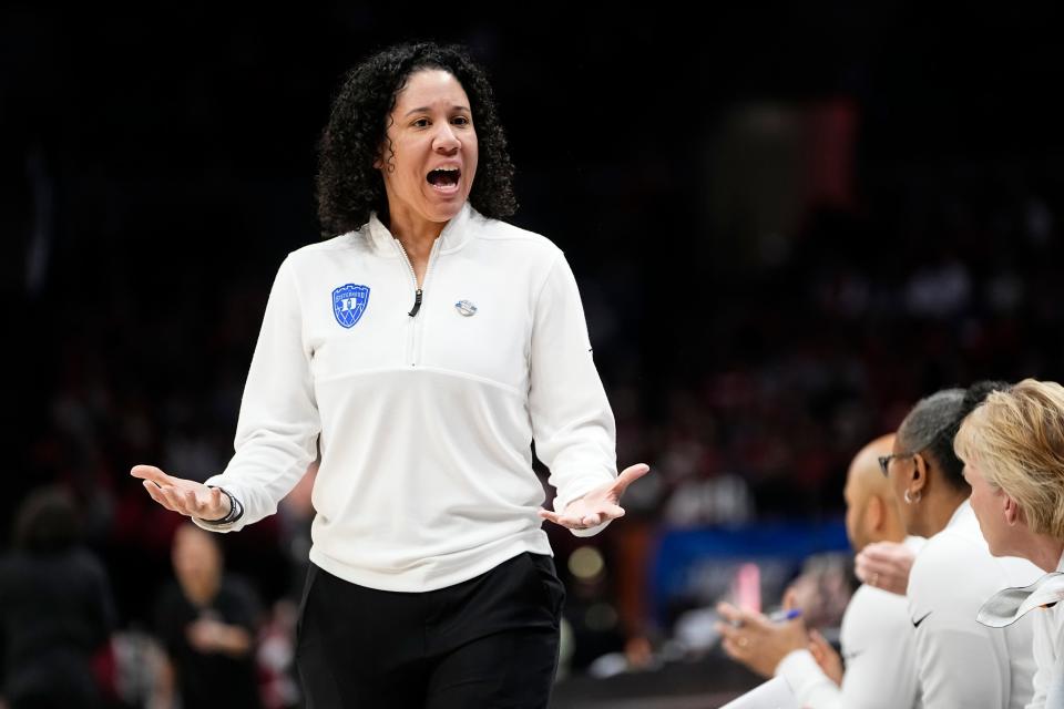 Duke coach Kara Lawson talks to her bench during Sunday's win over Ohio State.