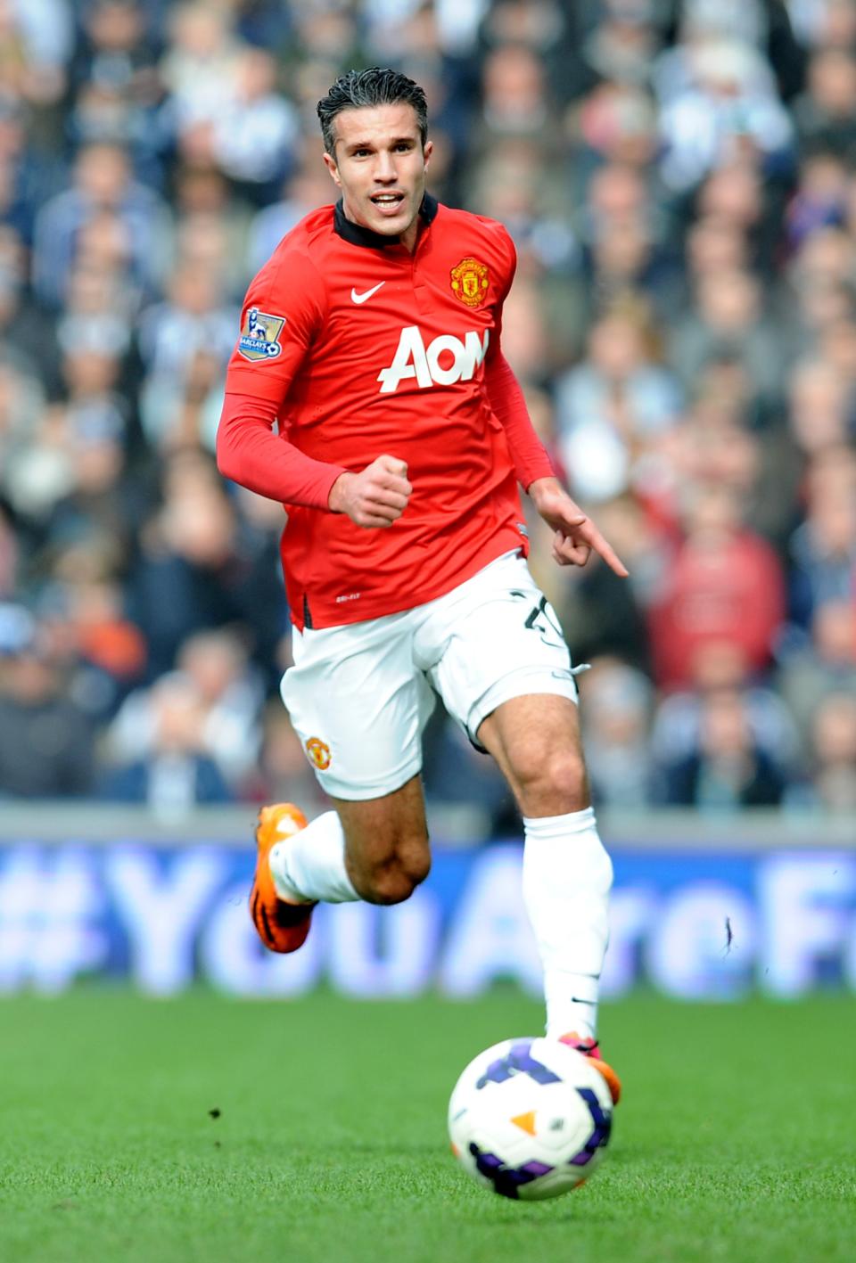 Manchester United's Robin van Persie during the English Premier League soccer match between West Bromwich Albion and Manchester United at The Hawthorns Stadium in West Bromwich, England, Saturday, March 8, 2014. (AP Photo/Rui Vieira)