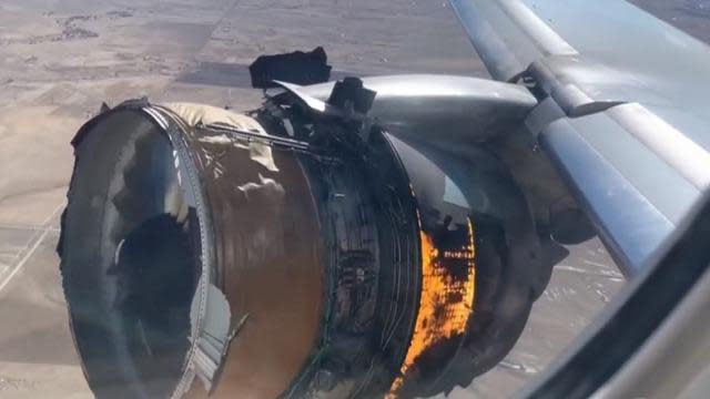 Engine is seen on fire on United Airlines Flight 328 over Denver on February 20, 2021. 