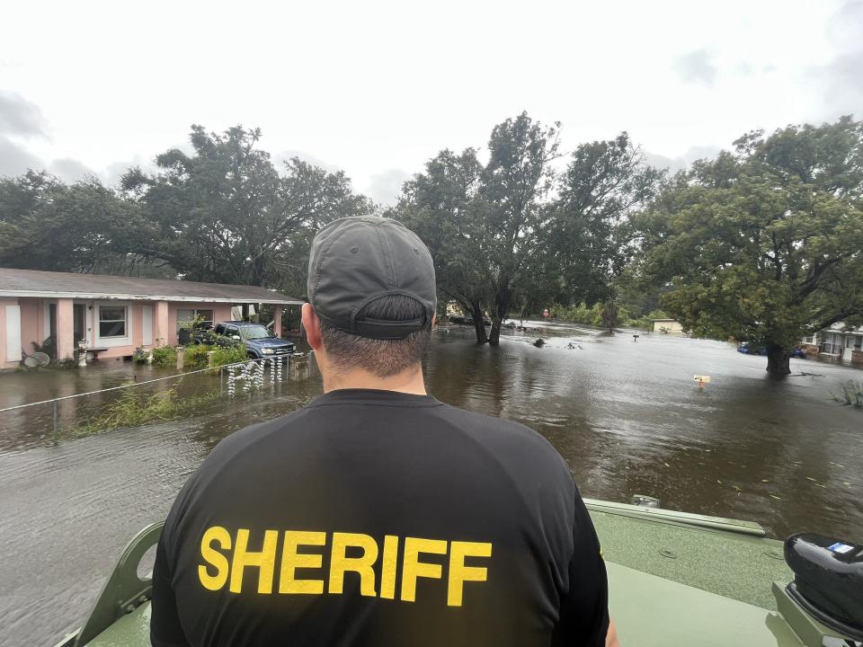 Crews around Central Florida help rescue people from Hurricane Ian’s floodwaters.