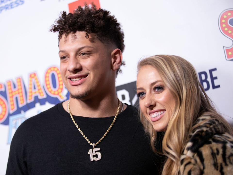 Patrick Mahomes and Brittany Matthews attend a red carpet.