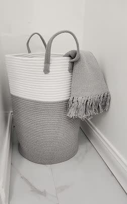 A soft, coiled rope laundry hamper