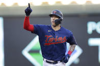 Minnesota Twins' Carlos Correa celebrates his home run against the Cleveland Guardians during the third inning of a baseball game Wednesday, June 22, 2022, in Minneapolis. (AP Photo/Andy Clayton-King)