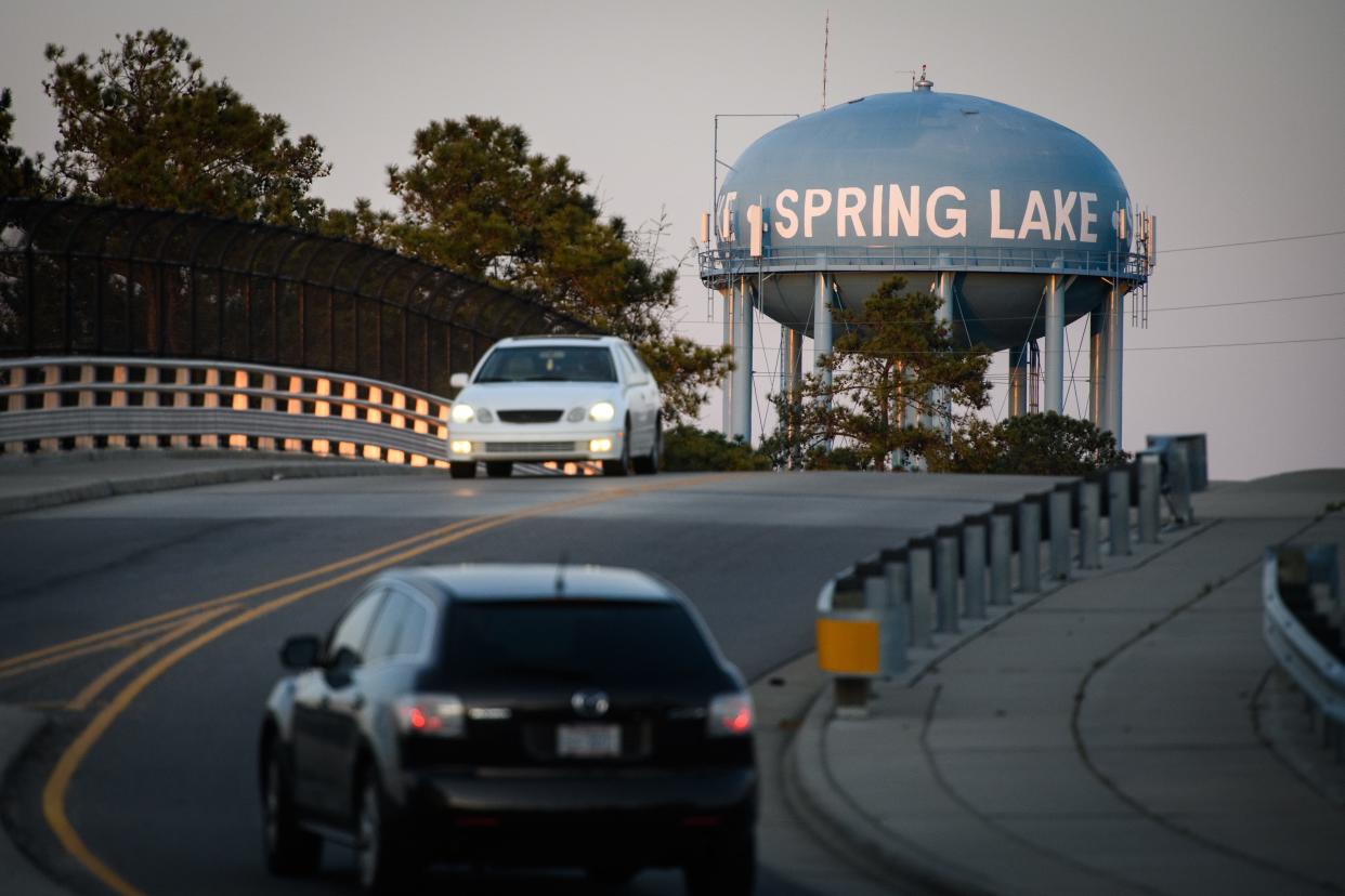 Cars drive over the Poe Avenue bridge in Spring Lake on Monday, March 28, 2022.
