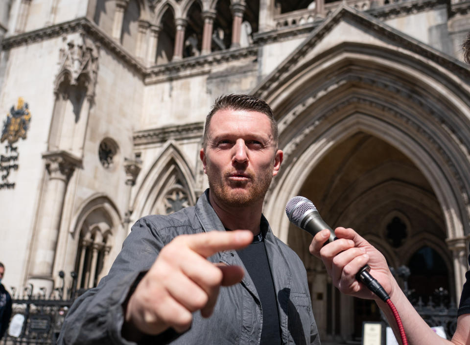 Tommy Robinson speaks as he leaves the Royal Courts Of Justice in London, after appearing for a contempt of court hearing. The English Defence League founder, whose real name is Stephen Yaxley-Lennon, failed to appear on March 22 in connection with unpaid legal bills after he lost a libel case brought against him by Syrian teenager Jamal Hijazi last year. Picture date: Friday May 6, 2022.