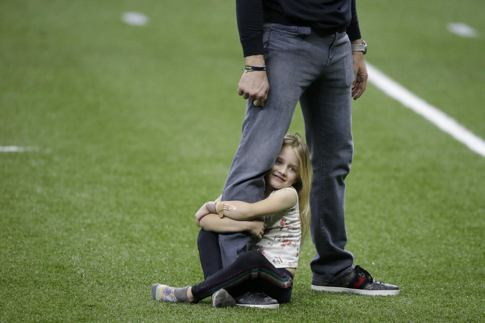 New Orleans Saints quarterback Drew Brees plays with his daughter Rylen Brees after an NFL divisional round playoff football game against the Tampa Bay Buccaneers, Sunday, Jan. 17, 2021, in New Orleans. The Tampa Bay Buccaneers won 30-20. (AP Photo/Butch Dill)