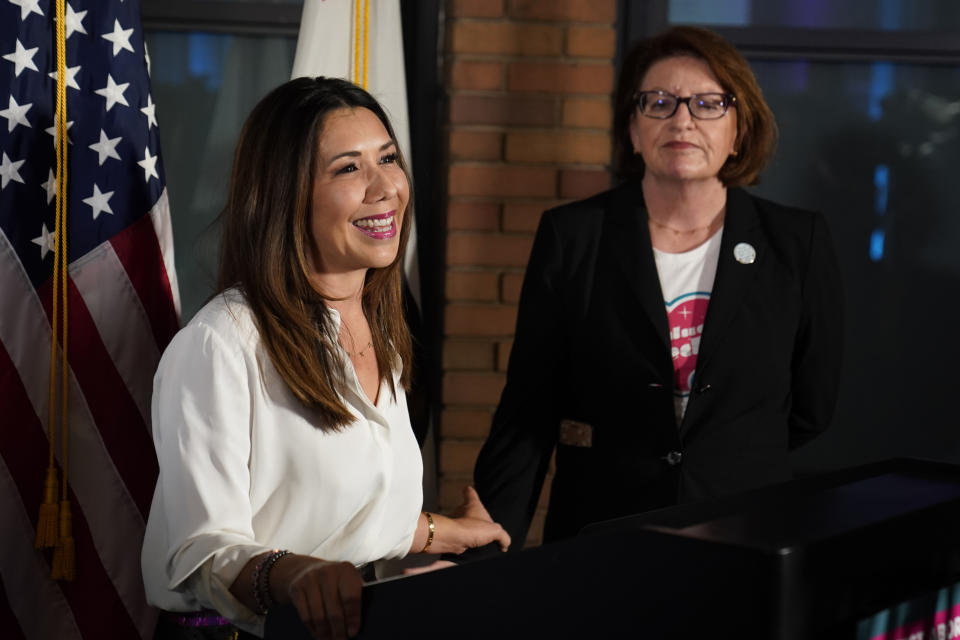 Jodie Hicks, chief executive officer and president of Planned Parenthood Affiliates of California, left, speaks to reporters at a gathering in support of Proposition 1, in Sacramento, Calif., Tuesday, Nov. 8, 2022. At right is California state Senate President Pro Tempore Toni Atkins. Abortion rights supporters won in the four states where access was on the ballot Tuesday, as voters enshrined it into the state constitution in battleground Michigan as well as blue California and Vermont and dealt a defeat to an anti-abortion measure in deep-red Kentucky. (AP Photo/Rich Pedroncelli)