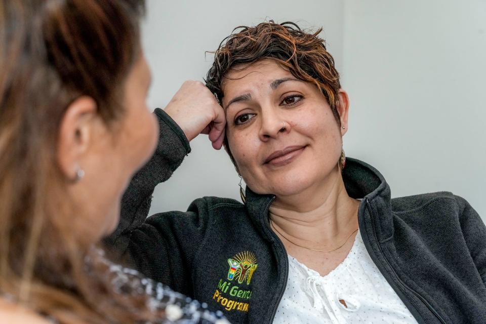Clinical psychologist Yovanska Duarté-Vélez, right, talks with client Georgina Lopez at the Mi Gente clinic at Bradley Hospital in East Providence, which specializes in the unique mental health needs of Hispanic children and their families.