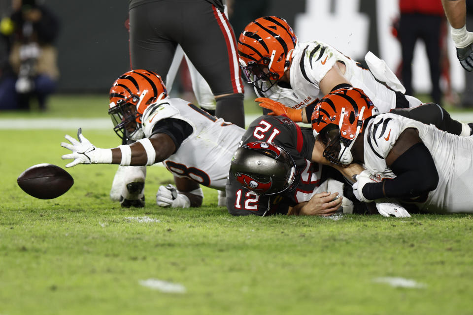 Tom Brady (12) and the Tampa Bay Buccaneers turned the ball over four times and blew a 17-point lead in an ugly loss to the Cincinnati Bengals. (Photo by Douglas P. DeFelice/Getty Images)