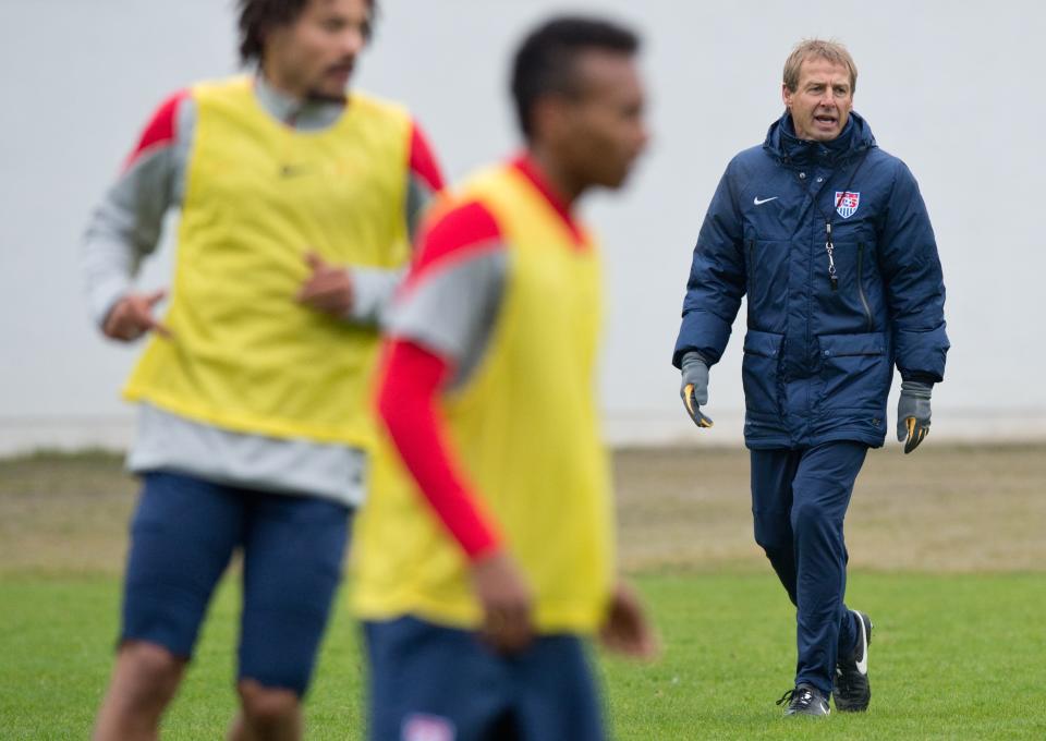 Juergen Klinsmann, coach of the US American national soccer team, leads a training session of his team in Frankfurt Germany, Monday March 3, 2014. The US team will face Ukraine on Cyprus on Wednesday. (AP Photo/dpa,Boris Roessler)