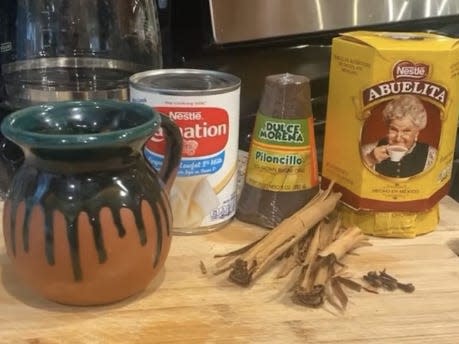 Traditional Mexican champurrado made with corn flour, chocolate, panela, and cinnamon.