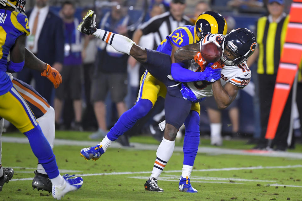 Los Angeles Rams cornerback Jalen Ramsey breaks up a pass intended for Chicago Bears wide receiver Taylor Gabriel, right, during the first half of an NFL football game Sunday, Nov. 17, 2019, in Los Angeles. (AP Photo/Mark J. Terrill)