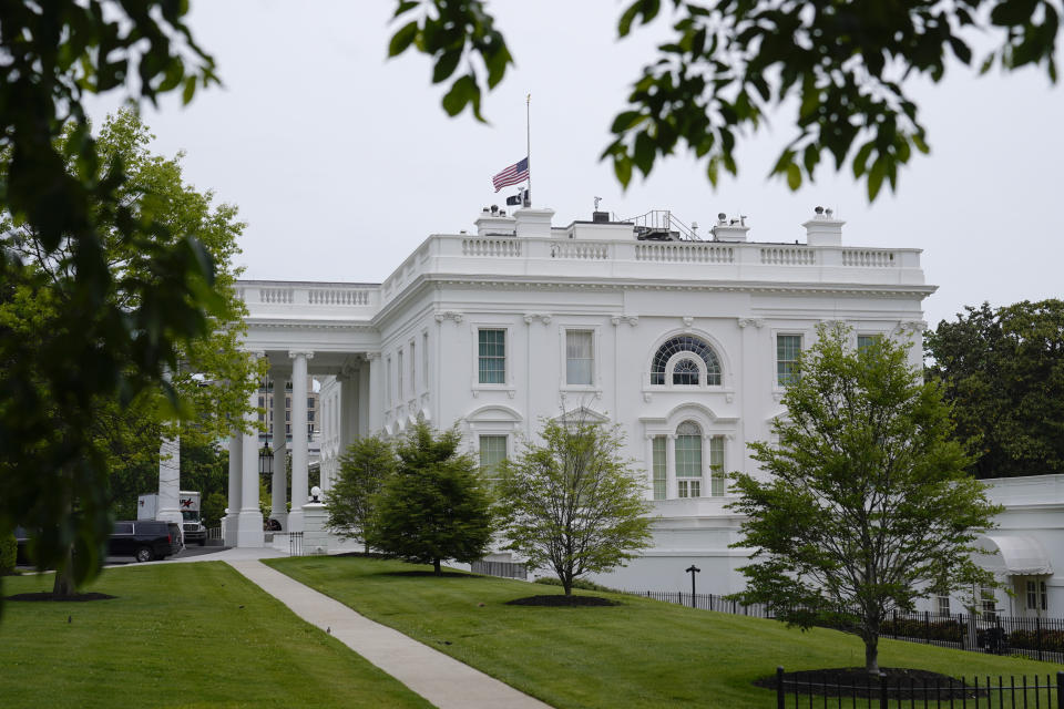 The American flag flies at half-staff at the White House in Washington, Sunday, May 7, 2023, after a mass shooting at a Dallas-area outlet mall. (AP Photo/Patrick Semansky)