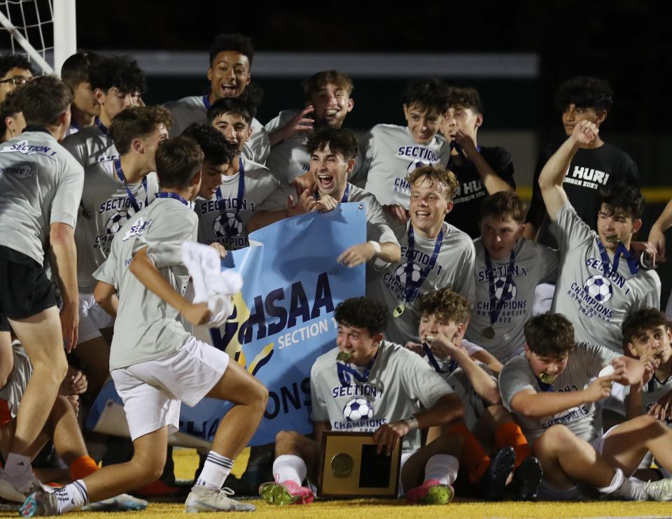 Byram Hills soccer players celebrate their 2-0 victory over Rye in the Class A Section 1 finals at Lakeland High School in Shrub Oak Oct. 28, 2023.